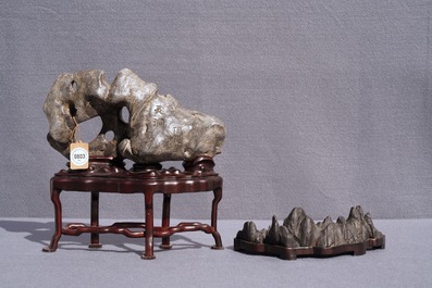 A pair of Chinese mother-of-pearl and lacquer stands and two scholar rocks, 19/20th C.